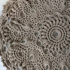 Knitted brown carpet related to Elevate Your Bedroom Décor with Handmade Elegance
