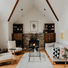 Lake house living room (IG: @clay.banks) related to Elevate Your Space: The Ultimate Guide to Living Room Window Valances