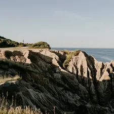 landscape photo of mountains near ocean during daytime related to Discover the Best Stays in Montauk