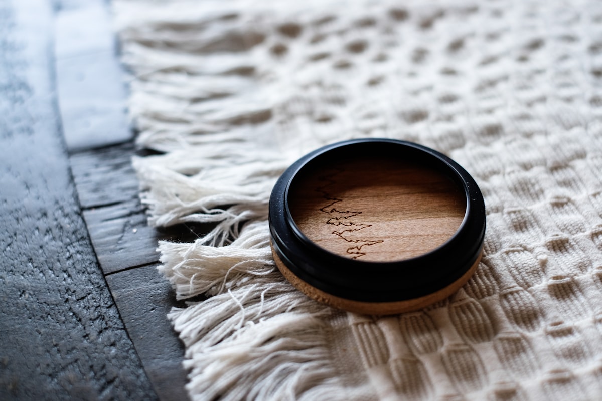 Lens cap by Captiv Co. related to Master Your Look with Bed Head Matte Separation Wax: The Ultimate Styling Solution