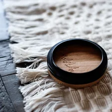 Lens cap by Captiv Co. related to Master Your Look with Bed Head Matte Separation Wax: The Ultimate Styling Solution