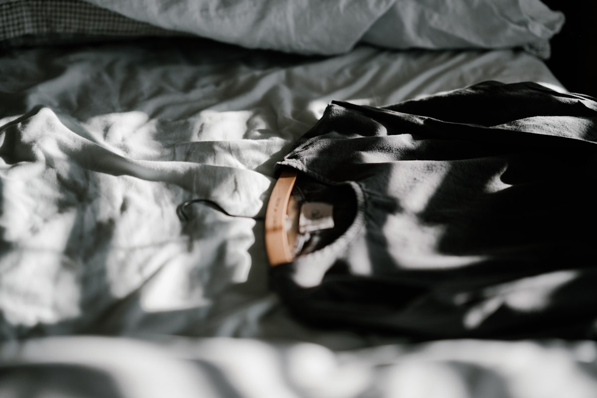 Linen dress on hanger related to The Ultimate Guide to Bed in a Bag Essentials