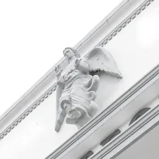 low-angle photography of angel on wall related to A Comprehensive Guide to Window Valance Clips