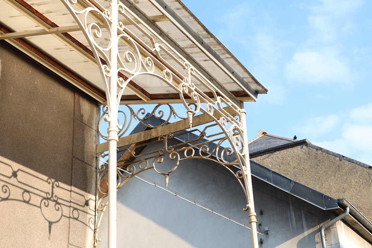 Luxembougish house during a sunny day related to Treasures in Steel: The Elegance of Iron Canopy Bed Frames