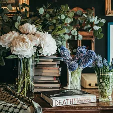 Many Flower book and frame in the room related to Unveiling the Beauty of Pate Meadows Valances: A Guide to Elevating Your Home Decor