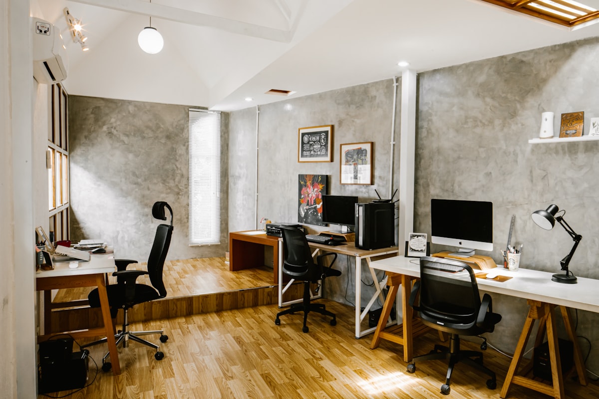 Modern office space with desks and computers related to Enhance Your Space with Attached Valance Curtain Sets