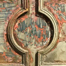 Motive on old iron gateway beeing restored related to The Timeless Appeal of a Distressed Pine Sideboard