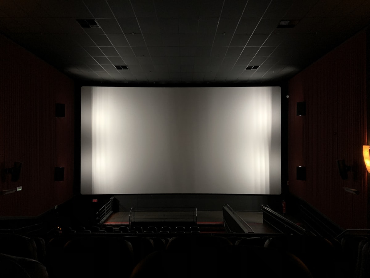 movie theater interior related to Luxuriate in Comfort: Movie Theaters Where Dreams Meet Sleep