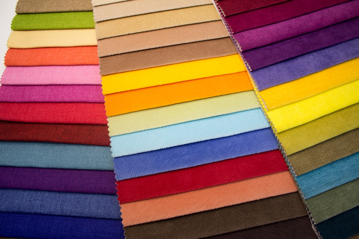 multi colored striped textile on brown wooden table related to The Ultimate Guide to Faux Suede Valances