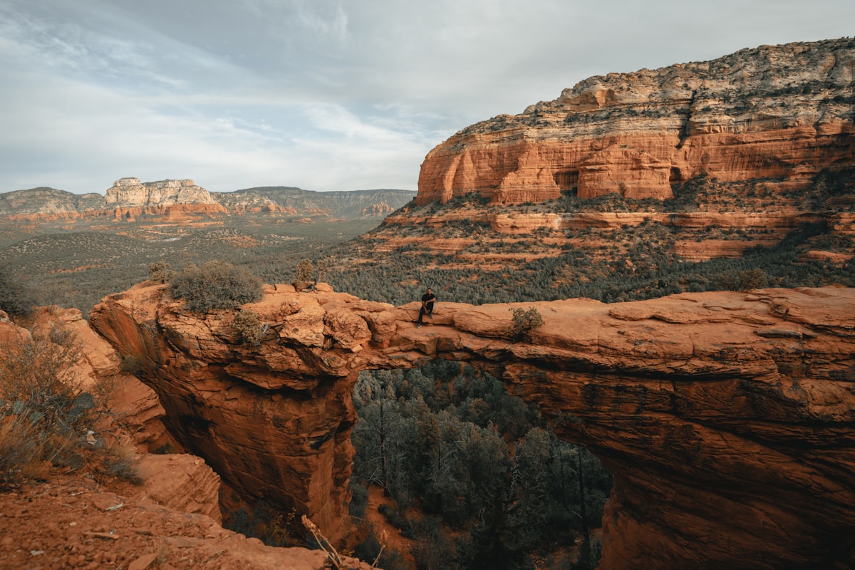 My buddy doin a sit on top of Devil's Bridge, Sedona [ IG: @clay.banks ] related to Discover the Perfect Retreat: Bed and Breakfast Sedona