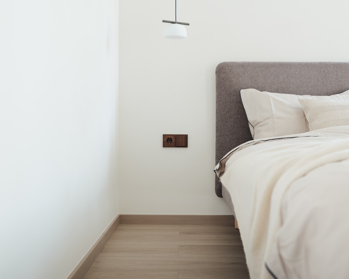 Natural thermowood surface showcasing rich texture and warm tones in a functional design element. related to The Ultimate Guide to Choosing a Minimal Bed Frame for Your Bedroom