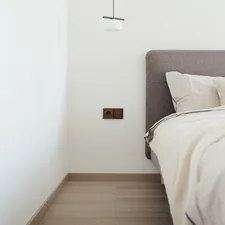 Natural thermowood surface showcasing rich texture and warm tones in a functional design element. related to The Ultimate Guide to Choosing a Minimal Bed Frame for Your Bedroom