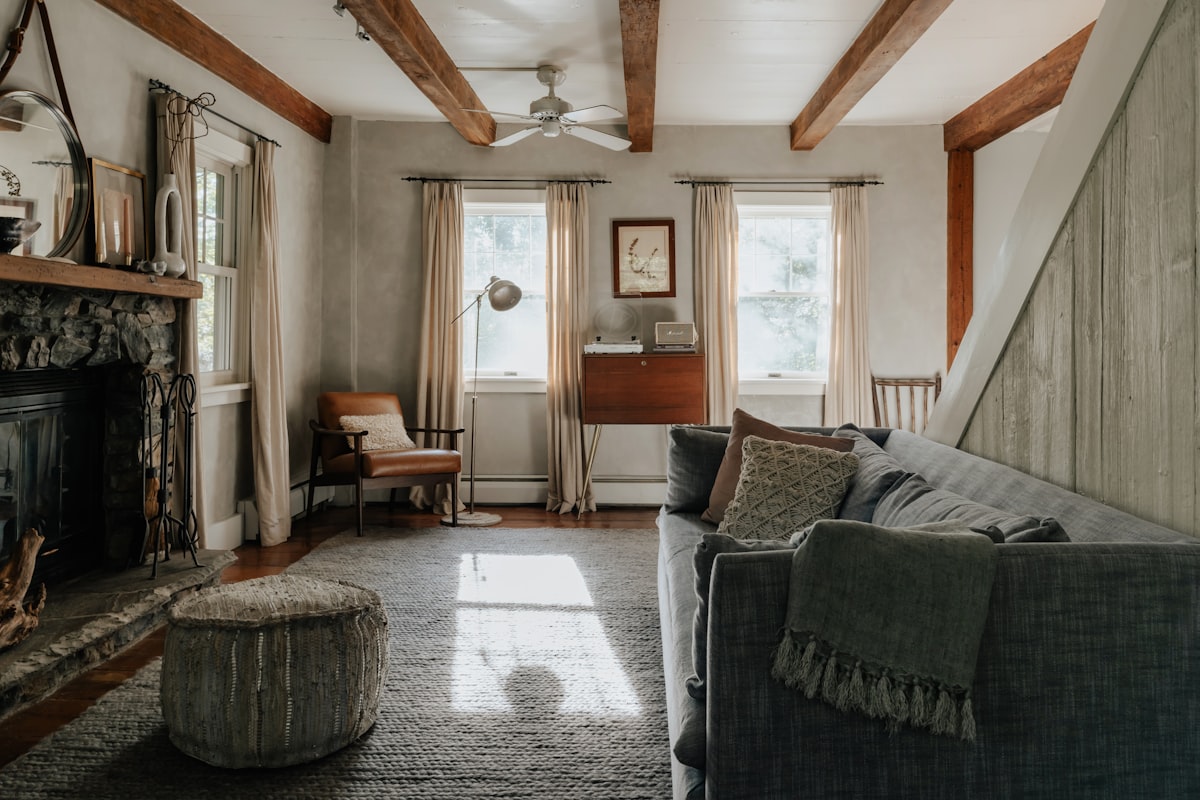 Neutral tone living room (IG: @clay.banks) related to Living Room Valance Guide