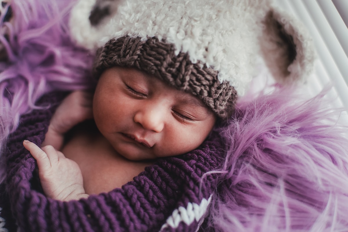 New Born Baby BabyPhotoshoot Purple Fur Costume related to Purple Reign: Creating a Majestic Nursery with Purple Baby Bedding