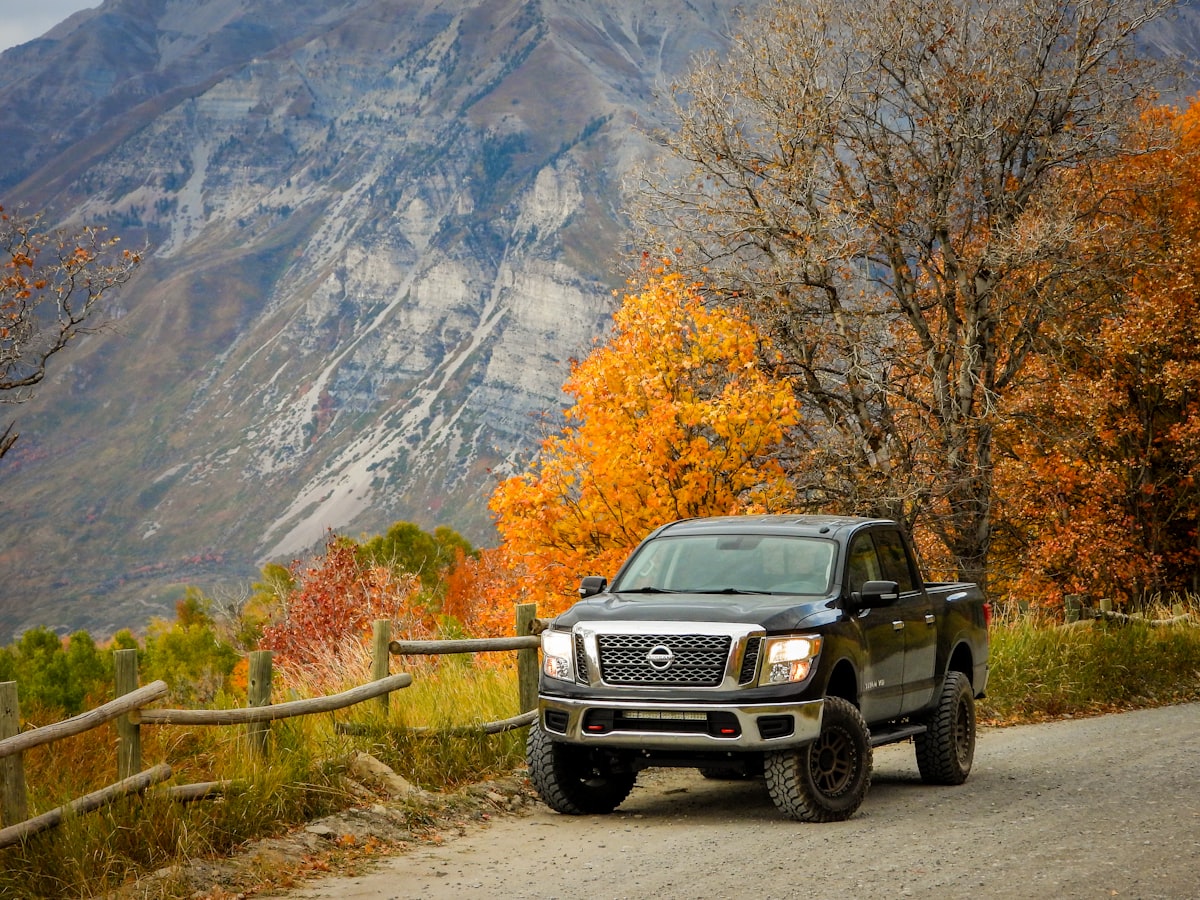 Nissan Titan in front of Mount Timpanogos in Utah related to Optimizing Cargo Space: Unveiling the Nissan Frontier Bed Dimensions