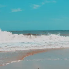 ocean waves crashing on shore during daytime related to Cozy Charm of Bethany Beach Bed and Breakfast