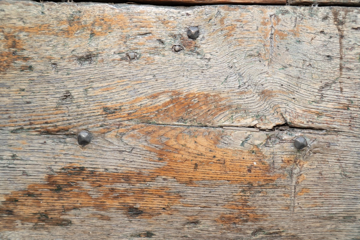 Old wood texture with nails related to The Timeless Appeal of a Distressed Pine Sideboard
