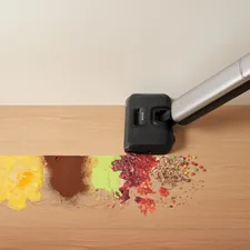 On the wooden floor, a Dreame wet dry vacuum cleans up common household spills, handling different types of everyday messes. related to Sweeping Deals: Roomba Vacuum at Bed Bath and Beyond