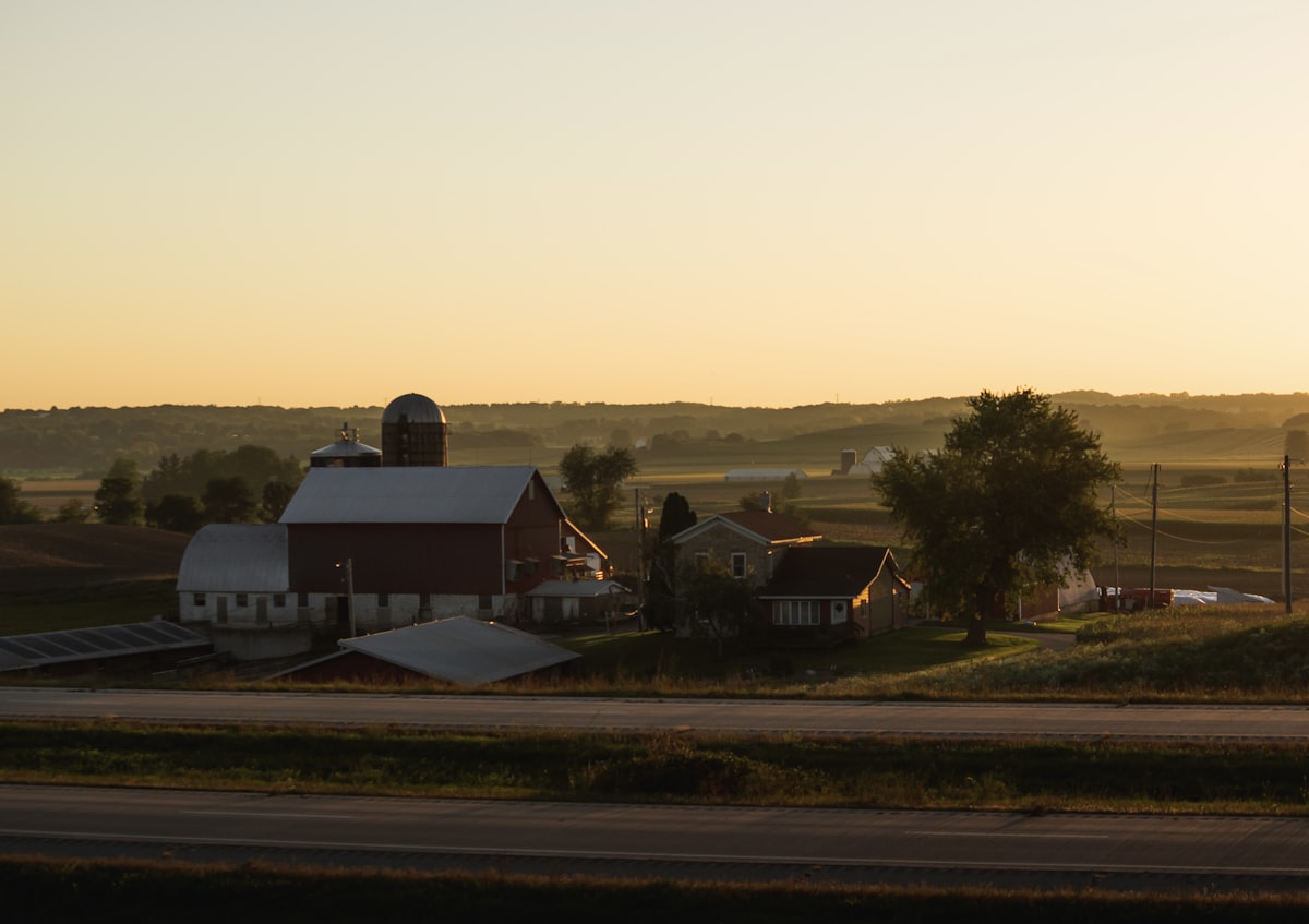 On what may be the last of the summer nights here in 2022, this beautiful landscape spanned across the wide stretch of corn fields and woods, with this farm pleasantly perched in a place where the sun lightly blanketed the scenery with its yellow rays. related to Charming Escapes: Exploring Farm Bed and Breakfasts