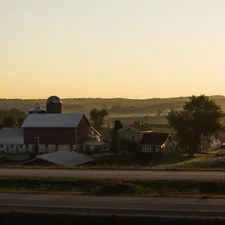 On what may be the last of the summer nights here in 2022, this beautiful landscape spanned across the wide stretch of corn fields and woods, with this farm pleasantly perched in a place where the sun lightly blanketed the scenery with its yellow rays. related to Charming Escapes: Exploring Farm Bed and Breakfasts
