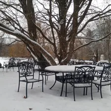 Open terrace of the restaurant "Prague" (winter). Expocentre of Ukraine (VDNG), Kyiv. - Открытая терраса ресторана "Прага" (зима), Экспоцентр Украины (ВДНХ), Киев. related to Warming Up Your Outdoor Space: The Benefits of Cast Iron Patio Chimineas
