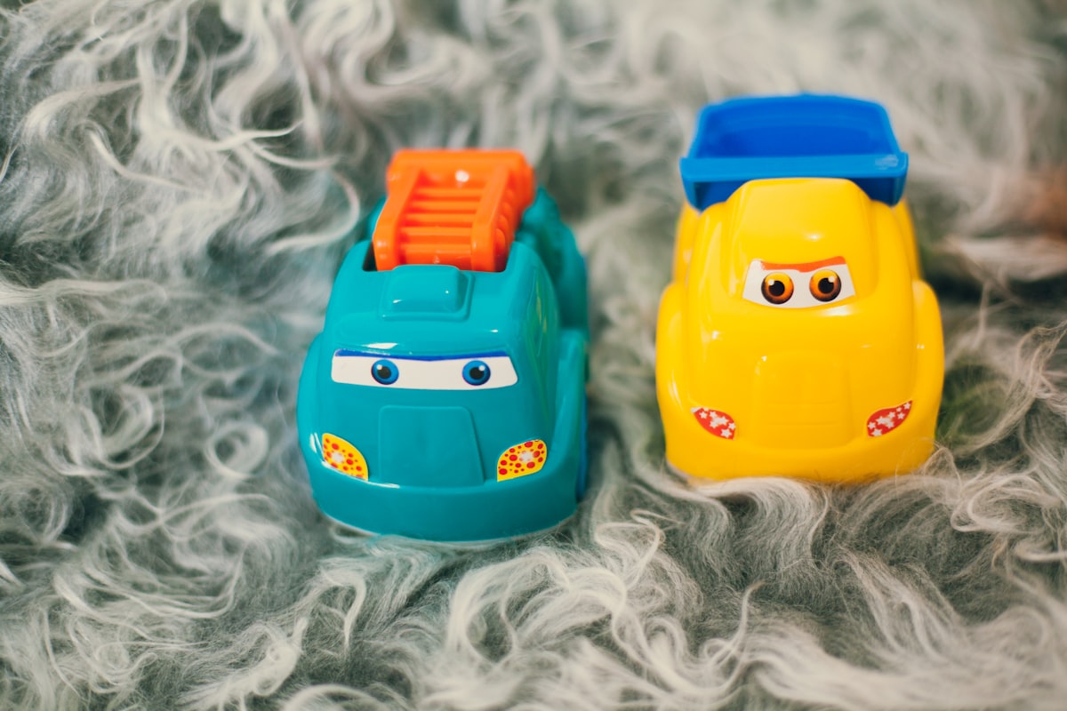 orange and black plastic toy related to Cars Toddler Beds