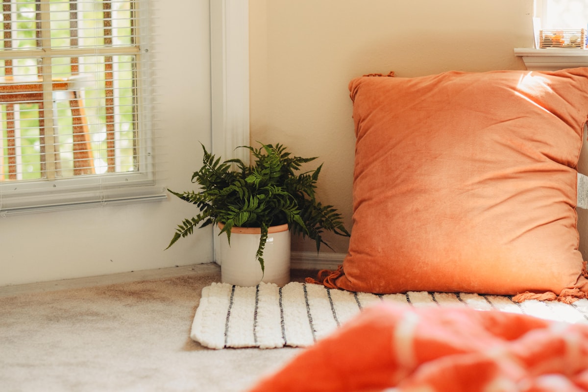orange throw pillow related to Burnt Orange Coverlet: Elevate Your Home Decor