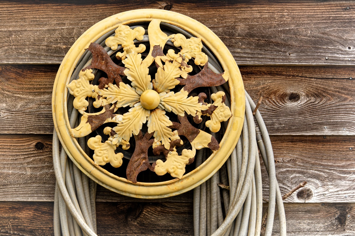 Ornamental Hose Holder related to Embrace the Warmth: The Cast Iron Chiminea Experience