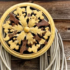 Ornamental Hose Holder related to Embrace the Warmth: The Cast Iron Chiminea Experience