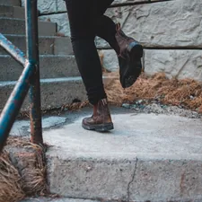 pair of brown leather boots related to How to Build a Chiminea: A Step-by-Step Guide