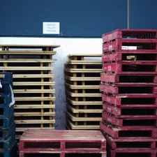 Pallets of contrasting colours related to Rustic Bed Makers: Transforming Pallets into Cozy Sleeping Spaces