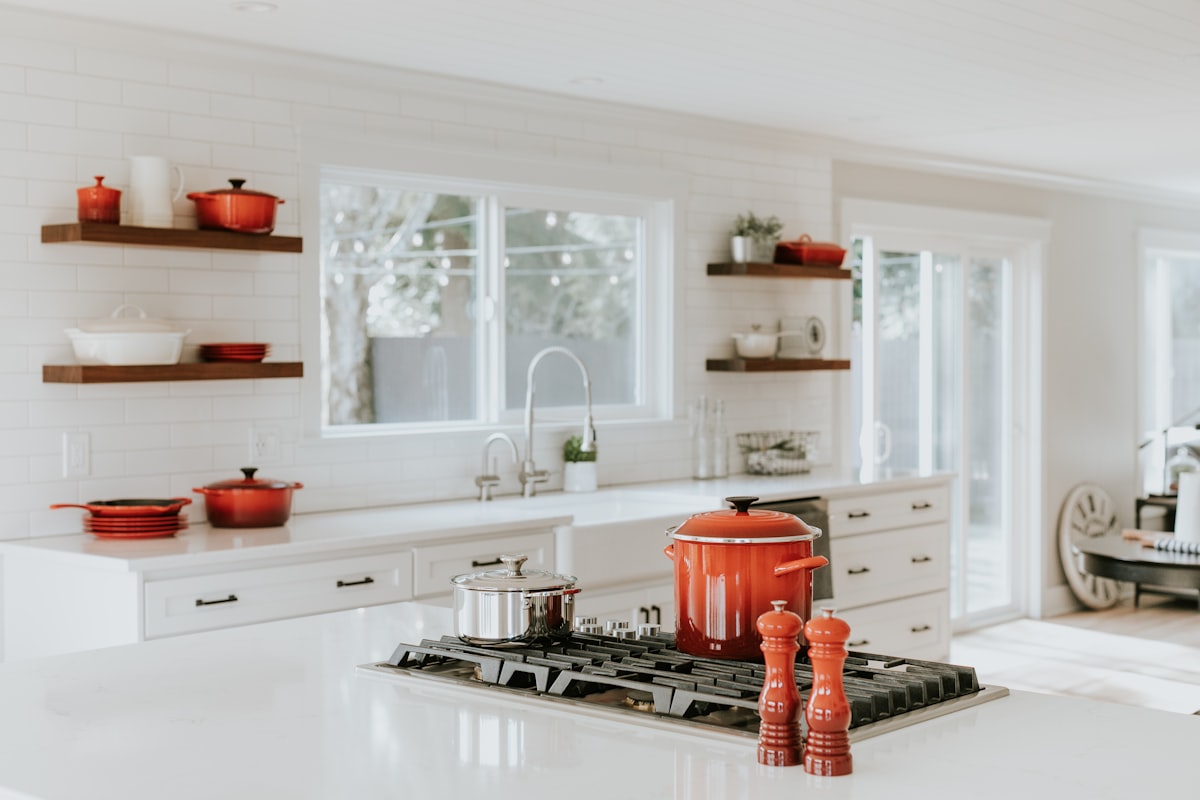 peppermill beside cooking pots related to Elevate Your Kitchen Style with Blue Kitchen Valances