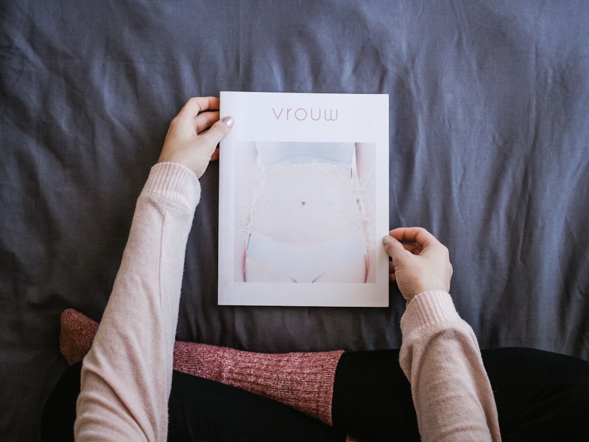 person holding frame related to Z Gallerie Bedding: A Guide to Choosing the Perfect Bedding