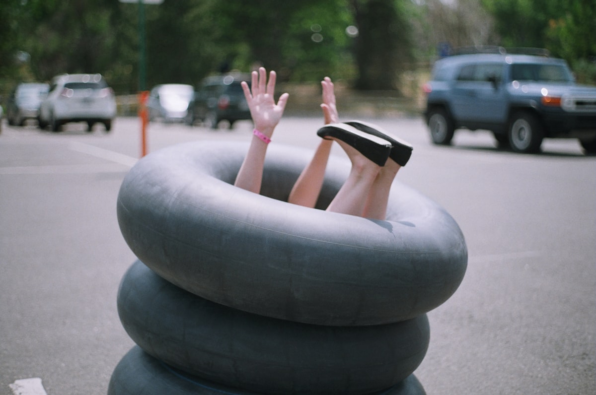 person sitting on inflatable rings related to Discover the Best Inflatable Bed Options at Target