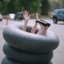 person sitting on inflatable rings related to Discover the Best Inflatable Bed Options at Target