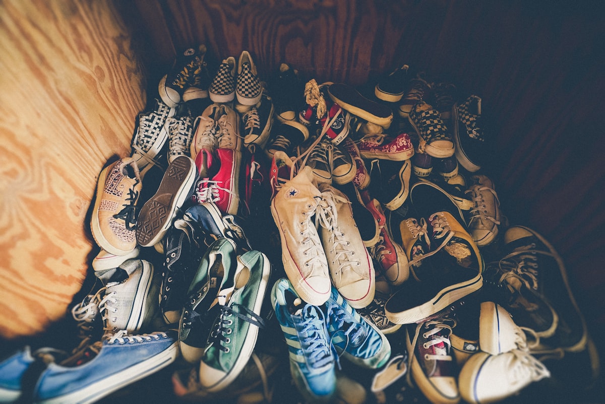 photography of assorted-color shoes lot on box related to 10 Clever Entryway Shoe Storage Solutions