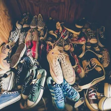 photography of assorted-color shoes lot on box related to 10 Clever Entryway Shoe Storage Solutions