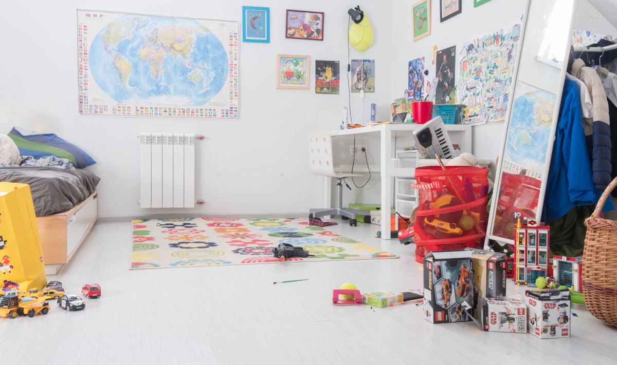 pile of assorted-color toy boxes related to Transforming Little Ones' Spaces: The Magic of Kids' Room Valances