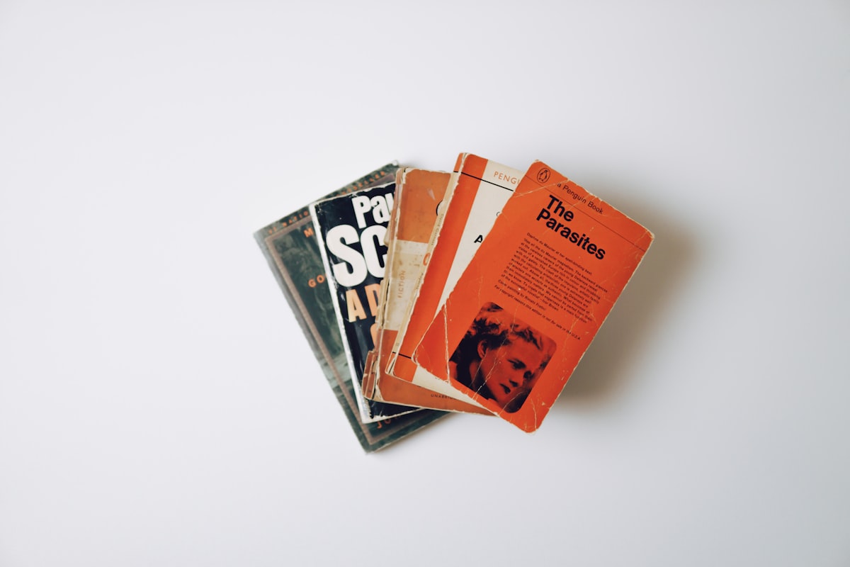 Pile of books on a white background. related to The Ultimate Guide to Covers for Truck Beds