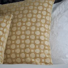 Pillows related to Luxurious White and Gold Bedding for a Regal Bedroom
