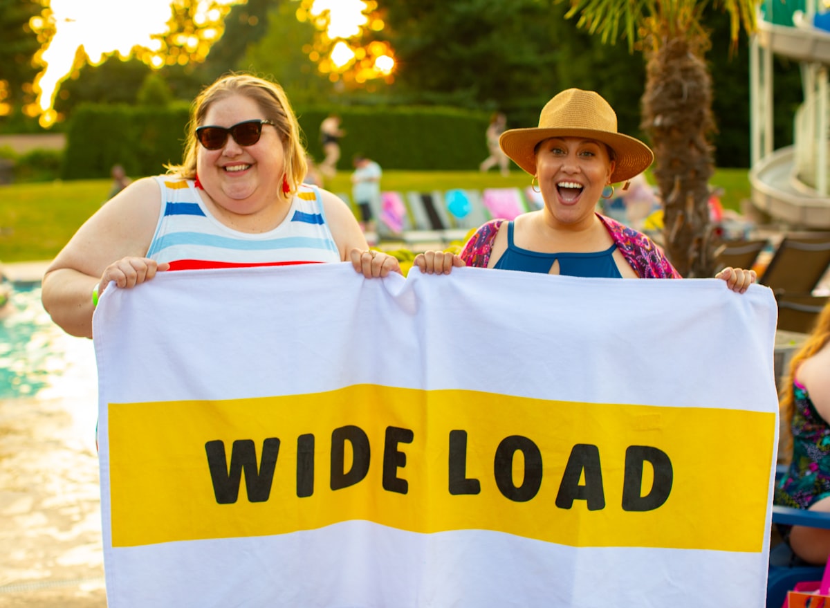 Plus size women at a pool party related to The Ultimate Guide to Double Bed Sizes: Everything You Need to Know