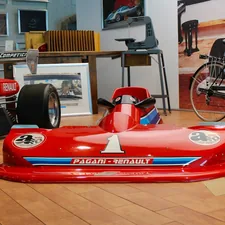 red and black go kart related to Start Your Engines: Ultimate Guide to Race Car Beds for Boys