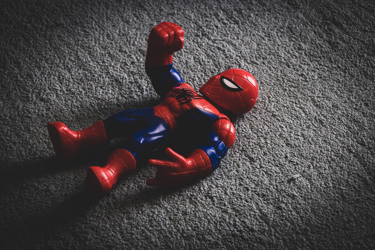 red and blue spider man action figure related to Swing into Fun with Spiderman Toddler Beds!