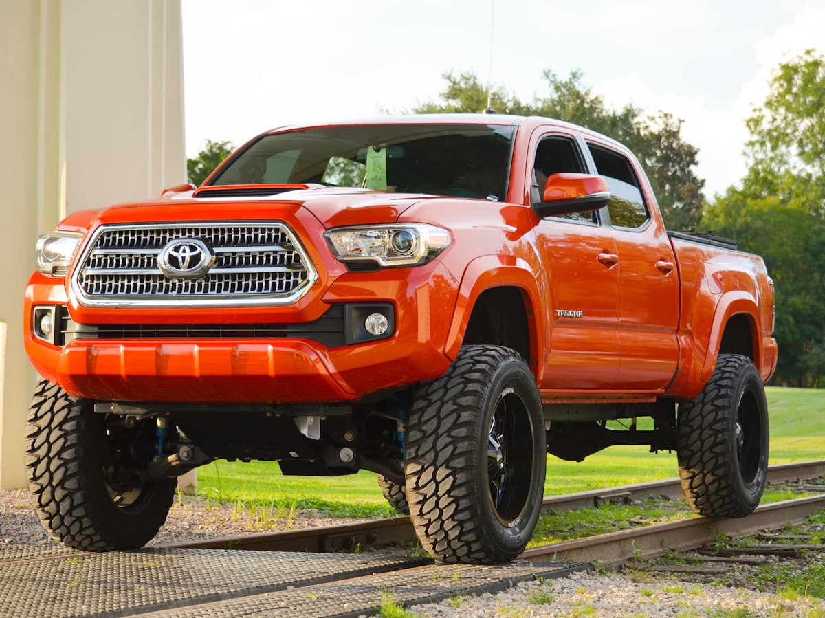 red chevrolet crew cab pickup truck related to Discovering the Best Toyota Tacoma Bed Size for Your Needs