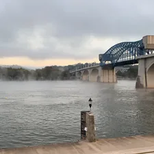 river under a white and blue bridge related to Cozy Retreat in the Scenic City: The Ultimate Guide to Bed and Breakfasts in Chattanooga, TN