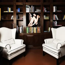 Rossella is a writer... where better could she be photographed? related to Maximizing Space with a Library Murphy Bed