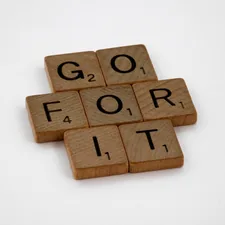 scrabble, scrabble pieces, lettering, letters, wood, scrabble tiles, white background, words, quote, letters, type, typography, design, layout, focus, bokeh, blur, photography, images, image, stop making excuses, excuses, procrastination, just do it, get started, commitment, plan, discipline, work, hard work, exercise, diet,  related to Maximizing Space: Tips and Tricks for Entryway Closet Doors