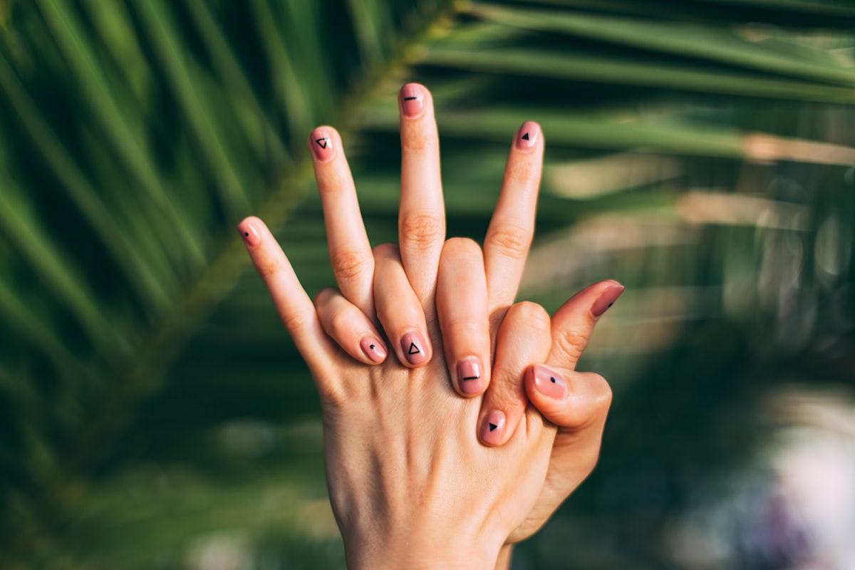 selective focus photography of person's hands related to Comfort at Your Fingertips: The World Market Bedding Experience