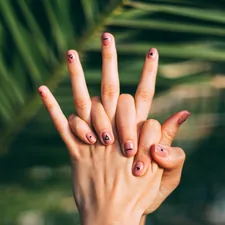 selective focus photography of person's hands related to Comfort at Your Fingertips: The World Market Bedding Experience
