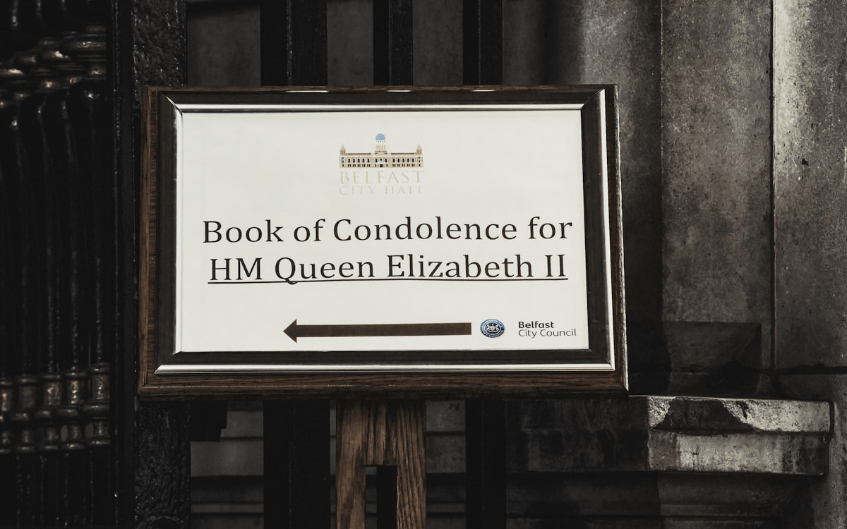 Sign at the entrance to Belfast City Hall for mourners to pay their respects to Queen Elizabeth (Sep. 2022). related to The Ultimate Guide to Queen Bed Box Springs